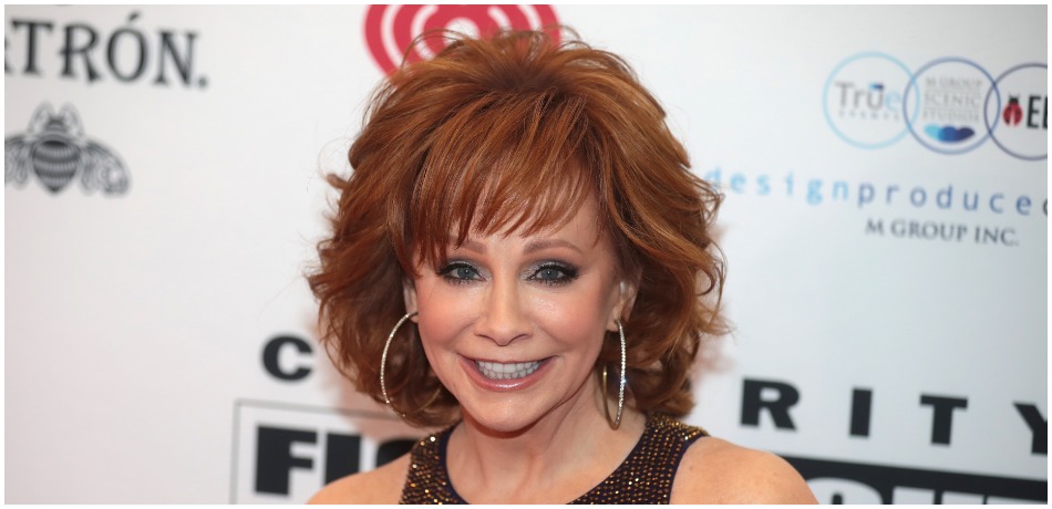 Reba McEntire on the red carpet at Celebrity Fight Night XXV at the JW Marriott Desert Ridge Resort & Spa in Phoenix, Arizona.