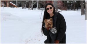 Demi Moore poses with her dogs.