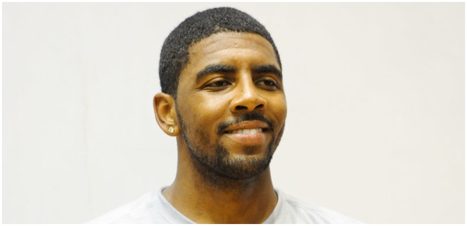 Kyrie Irving smiles