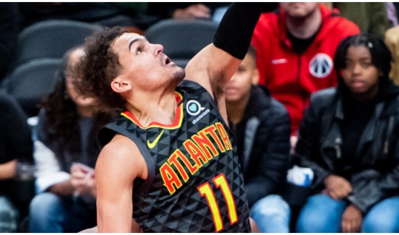 Trae Young takes a shot during an Atlanta Hawks game.