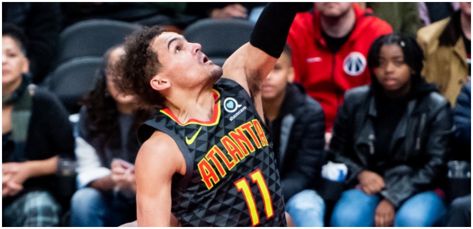 Trae Young takes a shot during an Atlanta Hawks game.