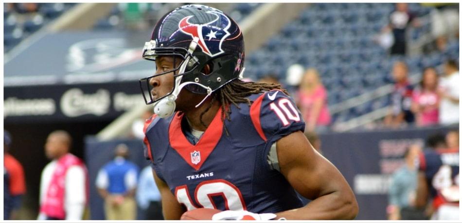 DeAndre Hopkins holding a football