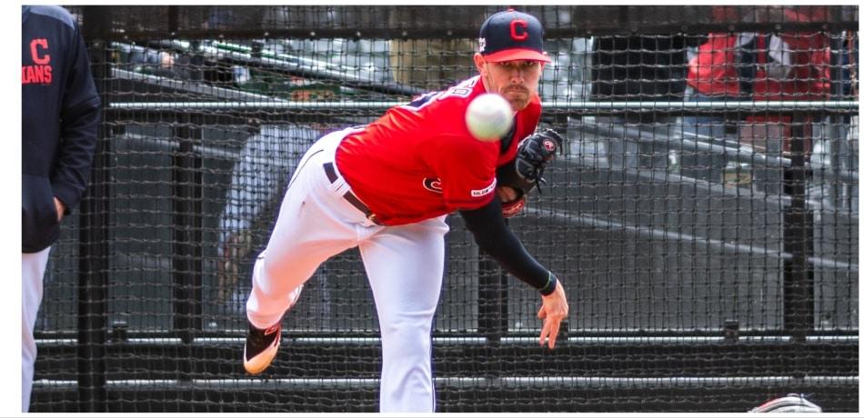 Shane Bieber throwing a pitch