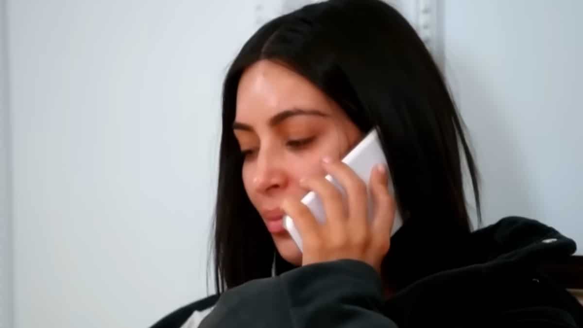 Kim Kardashian crying on the phone.